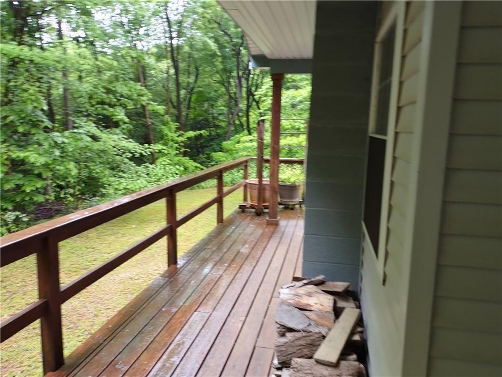 399 Long Road Utica, PA 16362 - Photo 10 of 17 a view of balcony with wooden floor