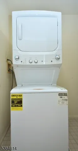 a kitchen with stainless steel appliances a refrigerator sink and cabinets