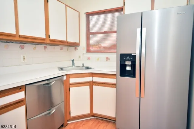 a view of a storage & utility room with racks on the wall