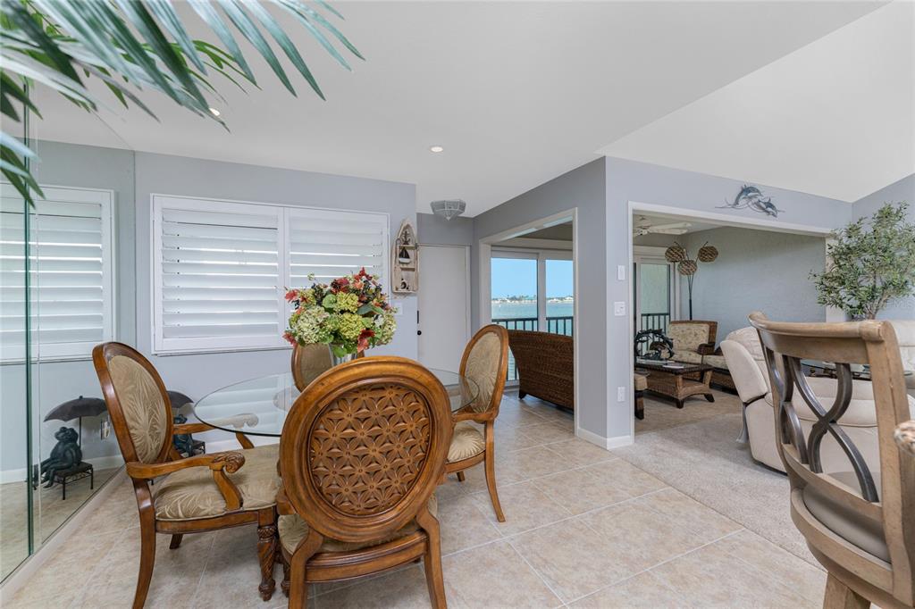 1401 Beach Road, Unit 303 Englewood, FL 34223 - Photo 21 of 63 a livingroom with furniture and a potted plant