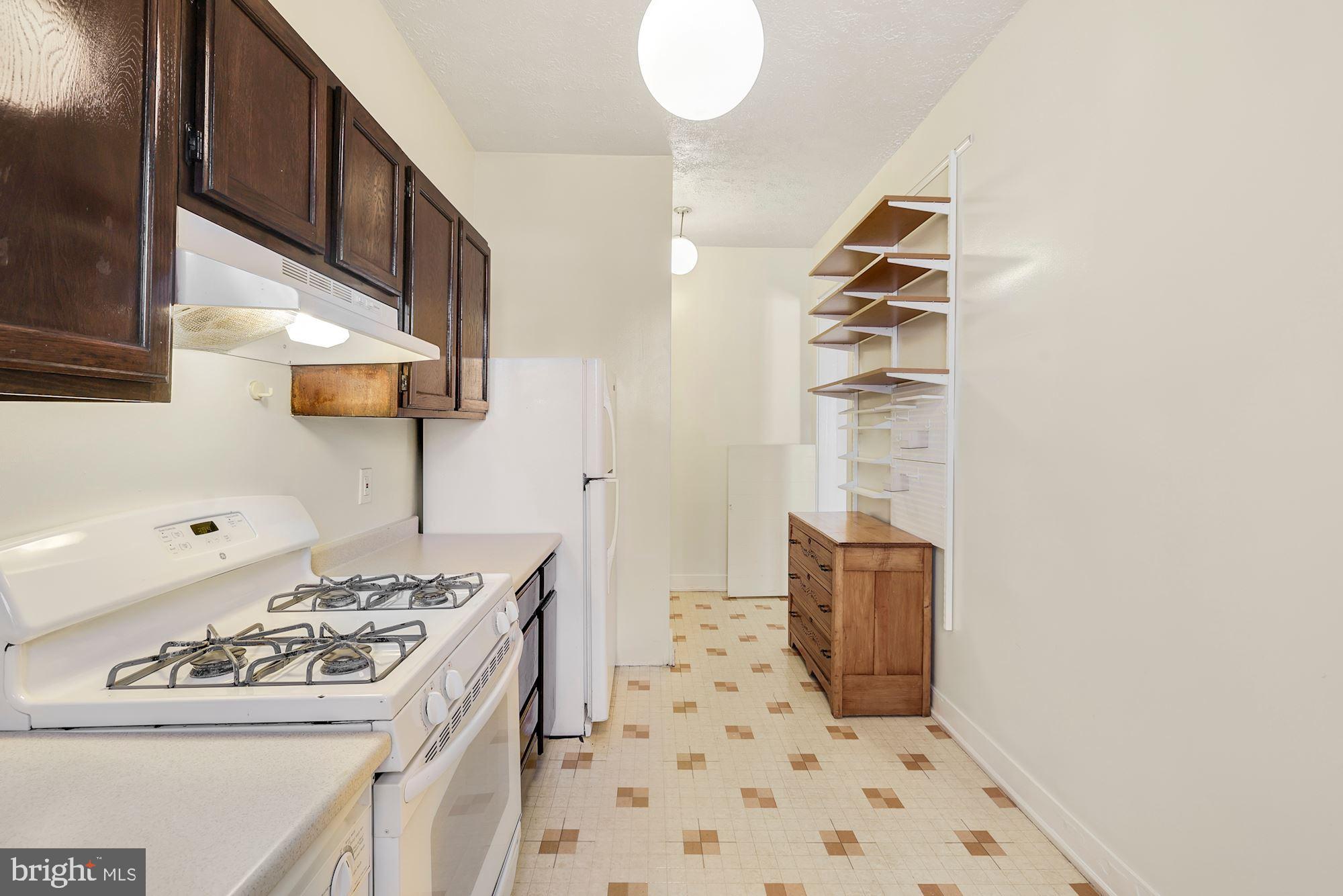2415 20th Street Northwest, Unit 34 Washington, DC 20009 - Photo 19 of 30 Imagine if you opened the kitchen up!
