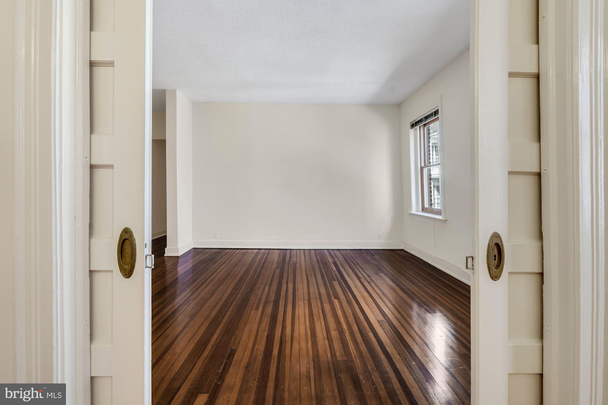 2415 20th Street Northwest, Unit 34 Washington, DC 20009 - Photo 8 of 30 Pocket Doors between LR & DR