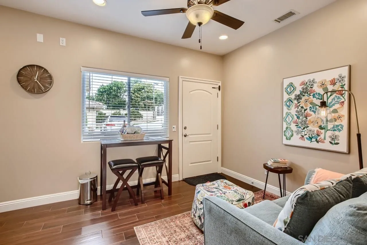 3965 Packard Lane Carlsbad, CA 92008 - Photo 21 of 32 a living room with furniture and a large window