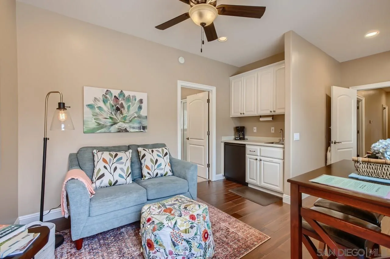 3965 Packard Lane Carlsbad, CA 92008 - Photo 22 of 32 a bedroom with furniture and a rug