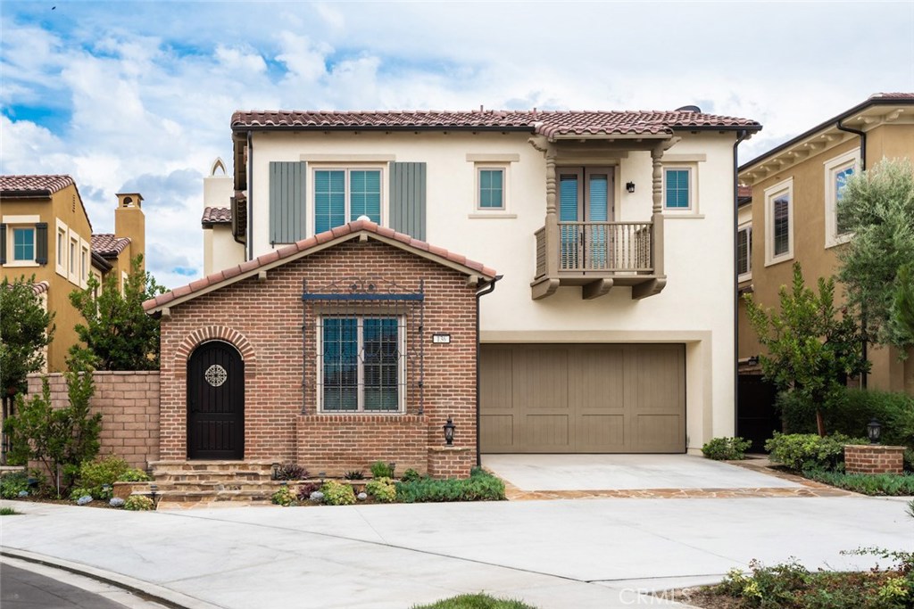 136 Long Fence Irvine, CA 92602 - Photo 1 of 26 a front view of a house with garden
