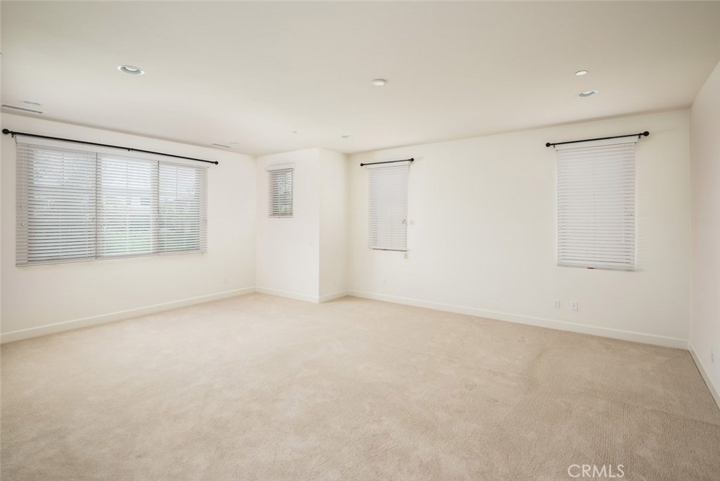 136 Long Fence Irvine, CA 92602 - Photo 18 of 26 an empty room with a empty space and windows