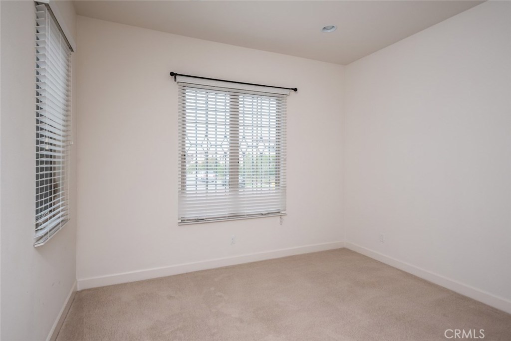 136 Long Fence Irvine, CA 92602 - Photo 24 of 26 an empty room with a window