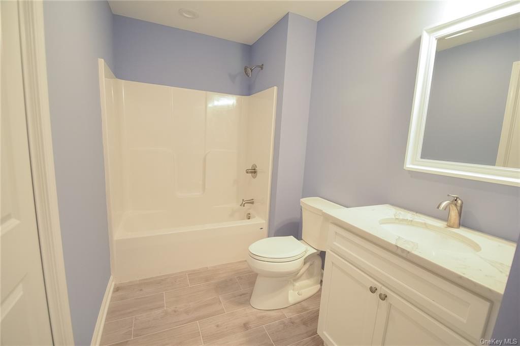 Lot #2 Old Forestburgh Road Sparrowbush, NY 12780 - Photo 13 of 17 a bathroom with a sink a toilet and a bathtub
