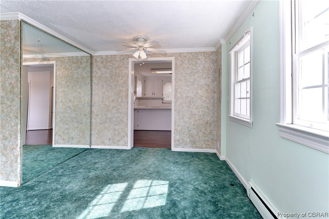 3159 Old Stage Road Toano, VA 23168 - Photo 7 of 44 Living space leading into the kitchen area
