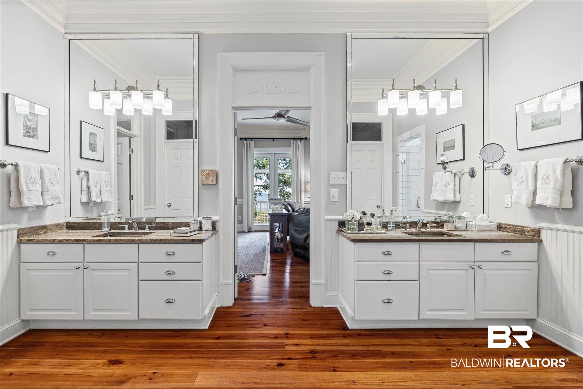 7015 Bay Road Mobile, AL 36605 - Photo 22 of 53 Bathroom with crown molding, a wainscoted wall, two vanities, dark wood finished floors, and ceiling fan