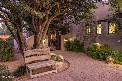 a view of a bench in a backyard