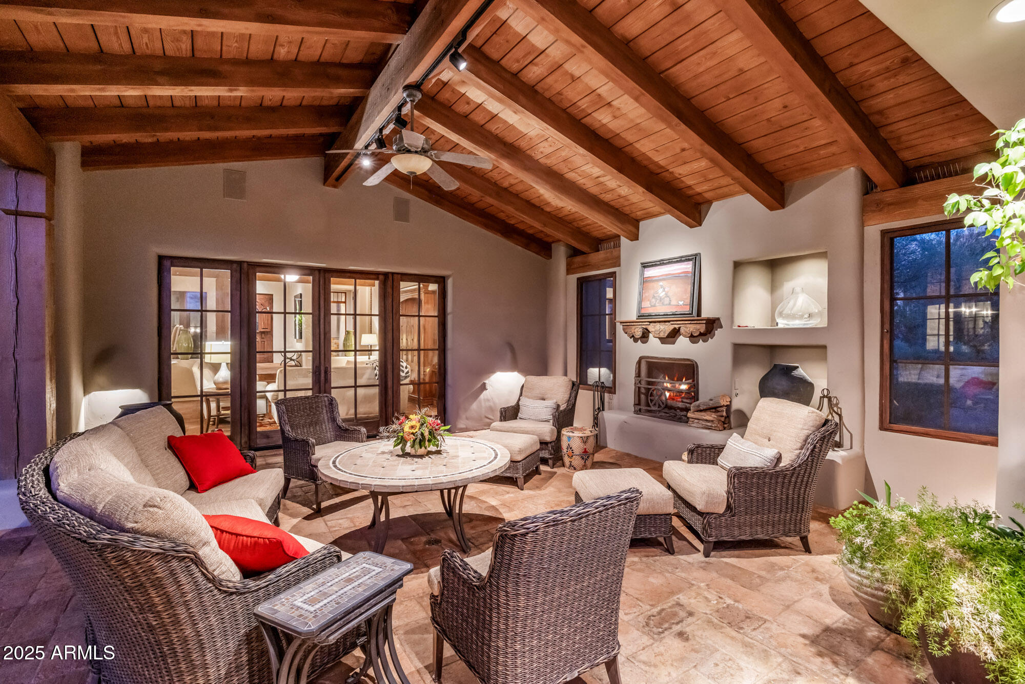 8300 East Dixileta Drive, Unit 211 Scottsdale, AZ 85266 - Photo 21 of 35 a living room with fireplace furniture and a large window