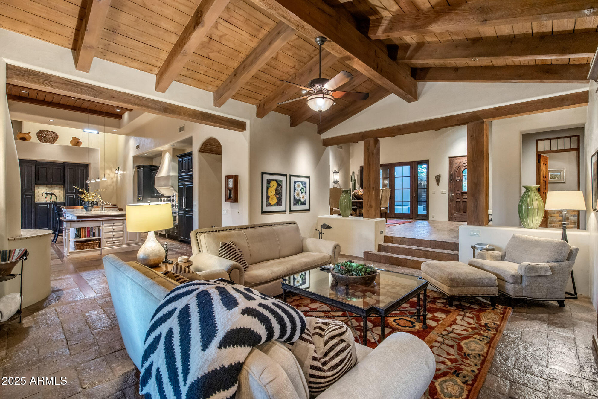 8300 East Dixileta Drive, Unit 211 Scottsdale, AZ 85266 - Photo 22 of 35 a living room with furniture and a large window