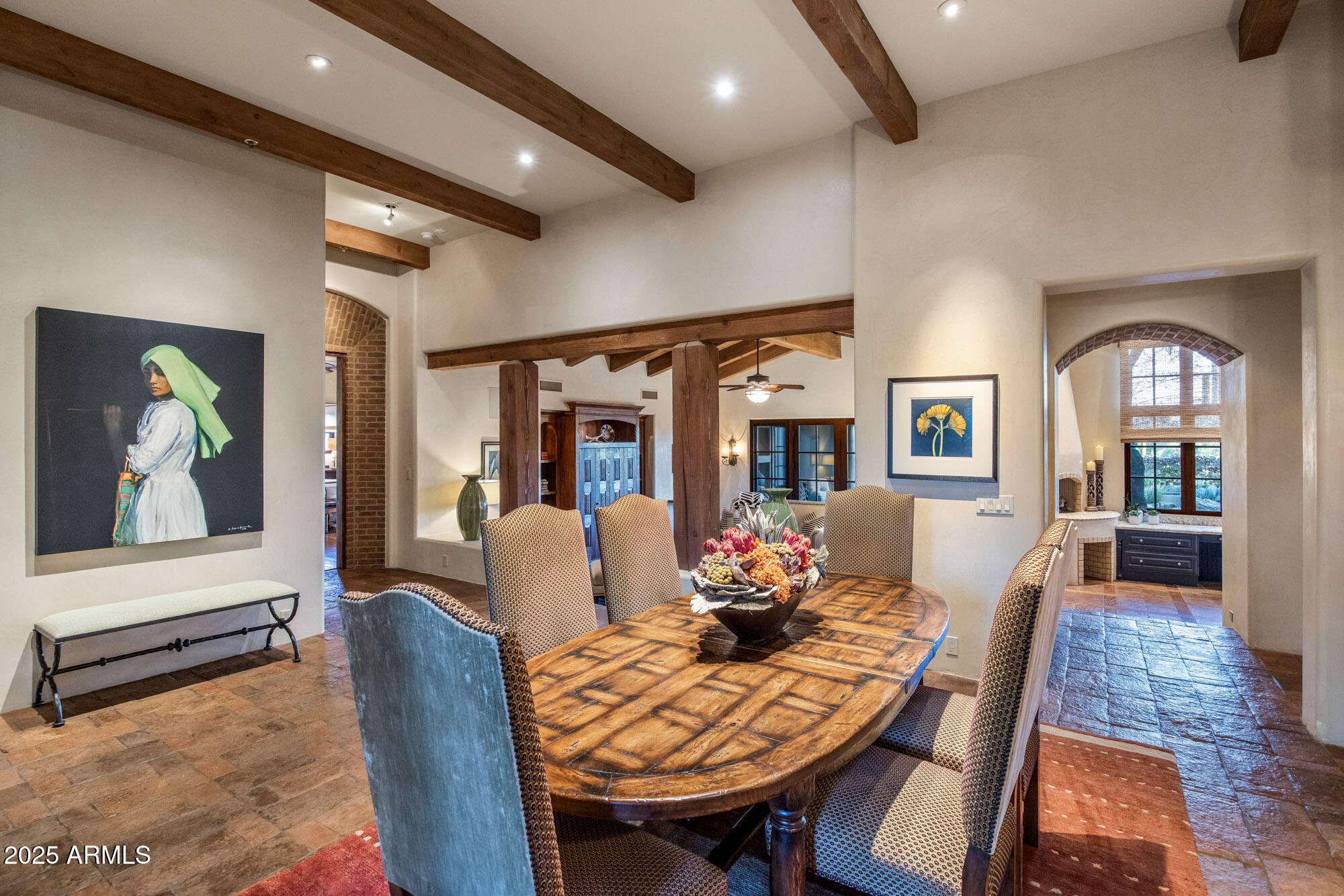 8300 East Dixileta Drive, Unit 211 Scottsdale, AZ 85266 - Photo 32 of 35 a view of a dining room with furniture window and wooden floor