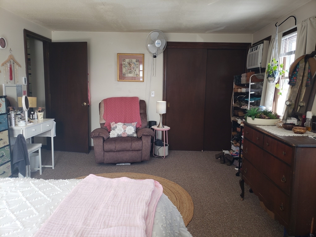 81-83 Motyka Street Ludlow, MA 01056 - Photo 15 of 20 a bedroom with furniture and a window