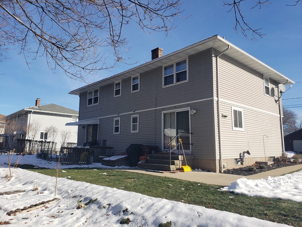 81-83 Motyka Street Ludlow, MA 01056 - Photo 20 of 20 a view of a house with snow on the floor