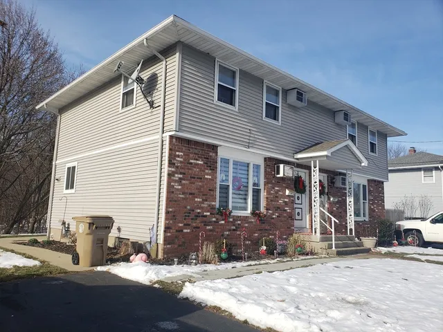 a view of a house with a patio
