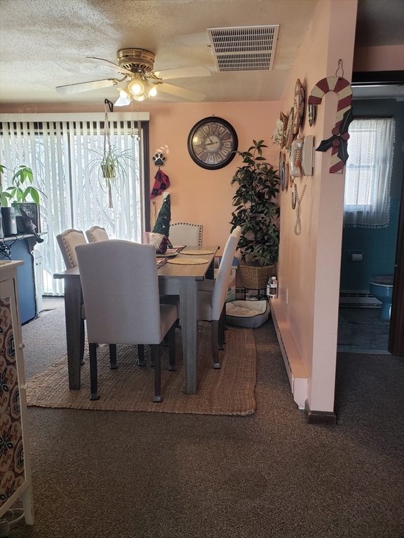81-83 Motyka Street Ludlow, MA 01056 - Photo 6 of 20 a view of a dining room with furniture and kitchen