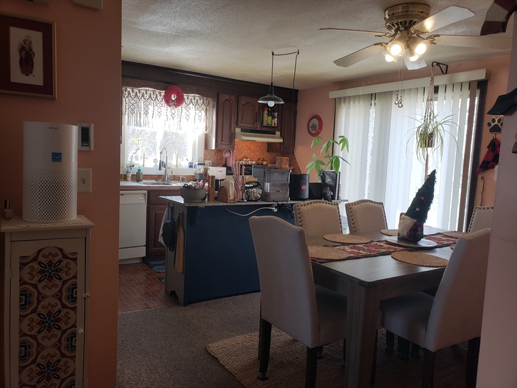 81-83 Motyka Street Ludlow, MA 01056 - Photo 7 of 20 a dining room with furniture and window