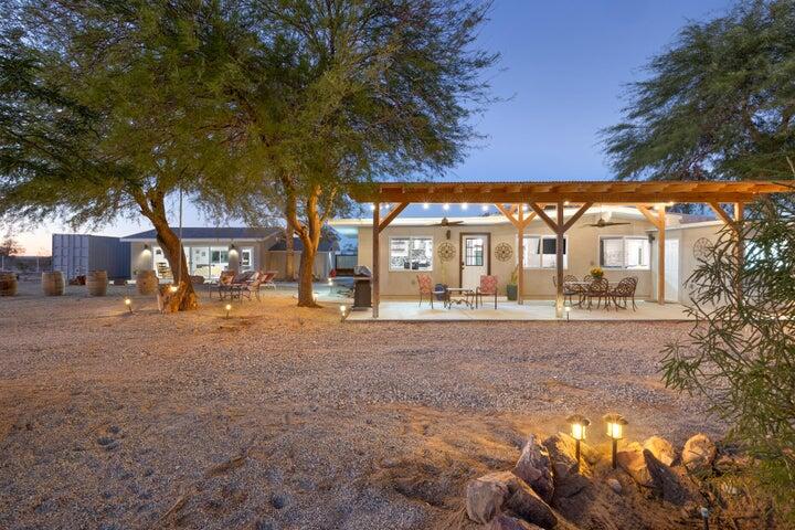 69450 Amboy Road Twentynine Palms, CA 92277 - Photo 27 of 46 a view of a house with a yard and tree s
