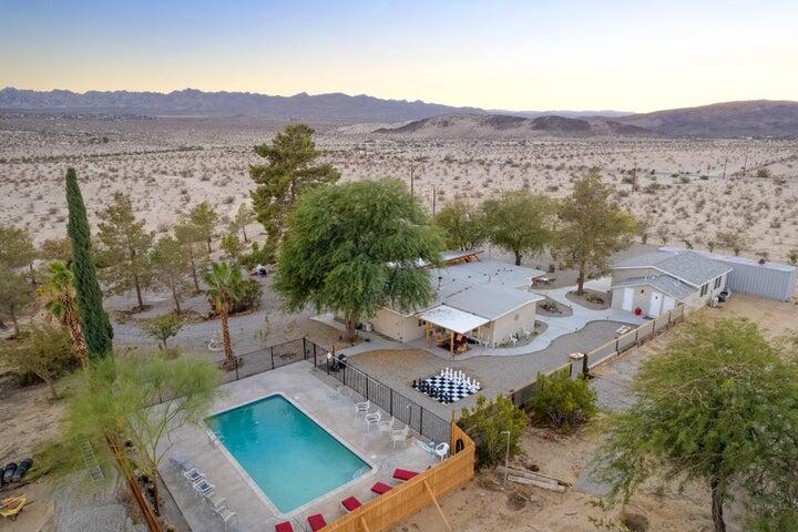 69450 Amboy Road Twentynine Palms, CA 92277 - Photo 34 of 46 an aerial view of residential house and sandy dunes