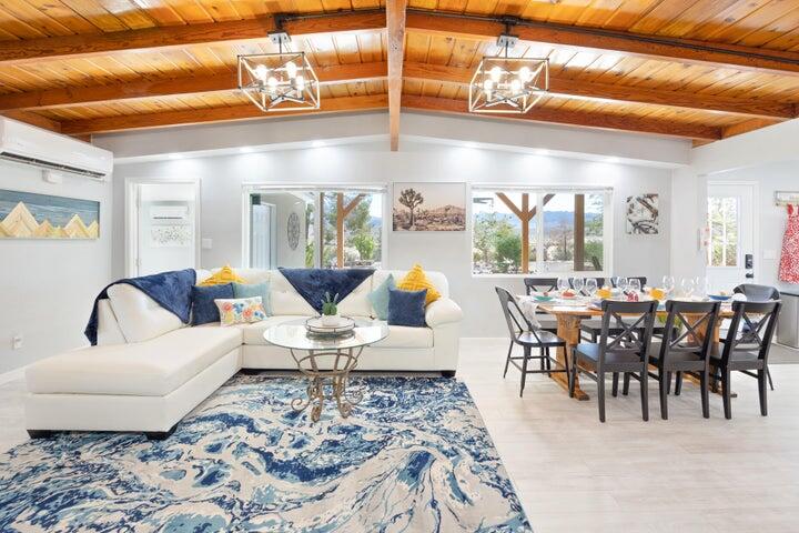 69450 Amboy Road Twentynine Palms, CA 92277 - Photo 5 of 46 a living room with furniture a rug and white walls