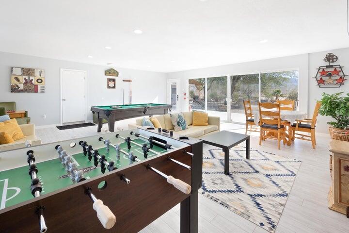 69450 Amboy Road Twentynine Palms, CA 92277 - Photo 9 of 46 a living room with furniture and a floor to ceiling window
