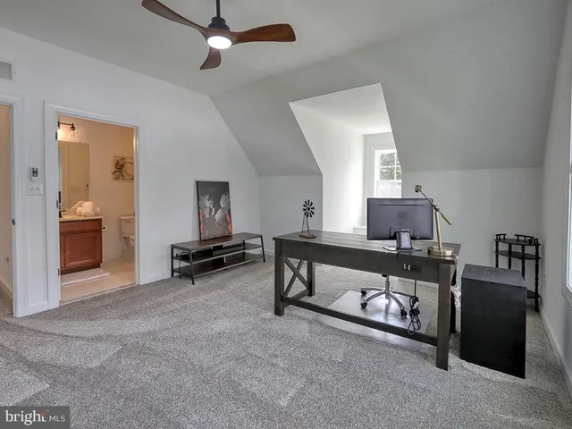 a bathroom with a toilet a sink and a shower