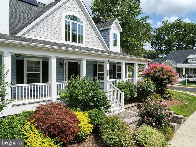 a view of a porch with wooden floor and outdoor space