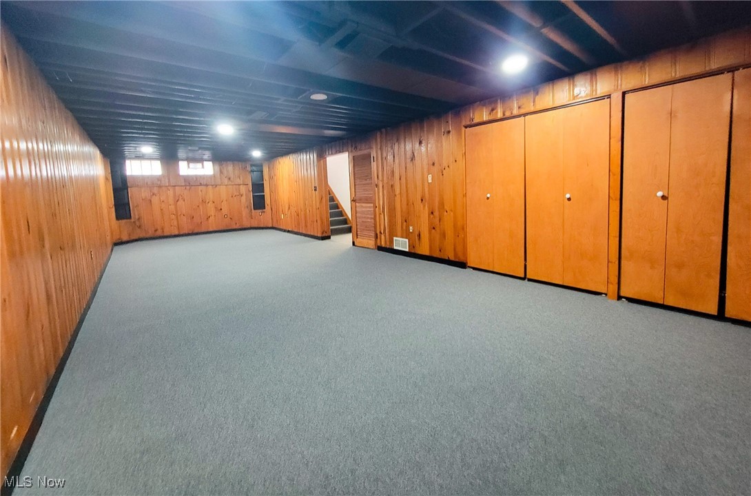 4160 Patton Road Cleveland, OH 44109 - Photo 13 of 20 Finished basement with recreational room or 2nd living room. Knotty pine paneling