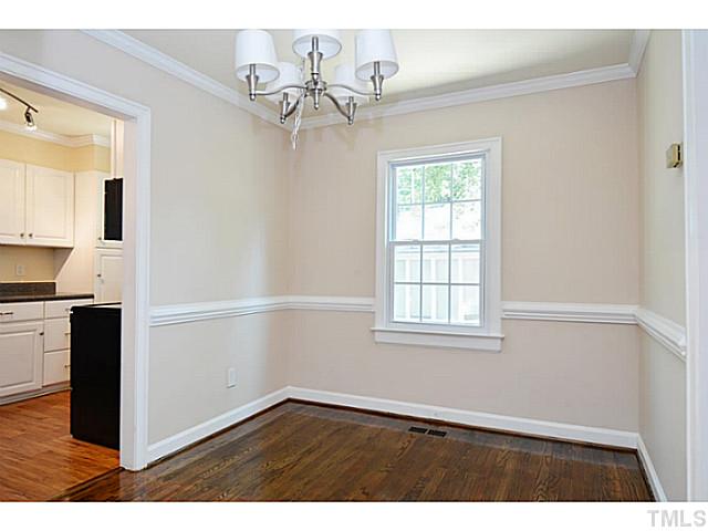 2011 Wake Forest Road Raleigh, NC 27608 - Photo 12 of 23 a view of an empty room with a window