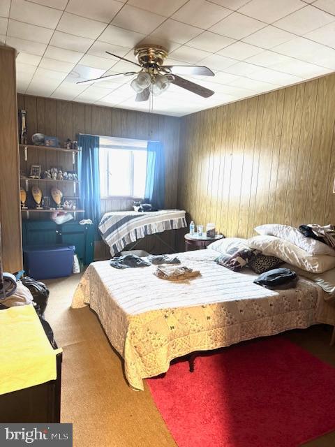 408 1/2 Chestnut Street Johnstown, PA 15906 - Photo 15 of 17 a bedroom with a bed and a chandelier