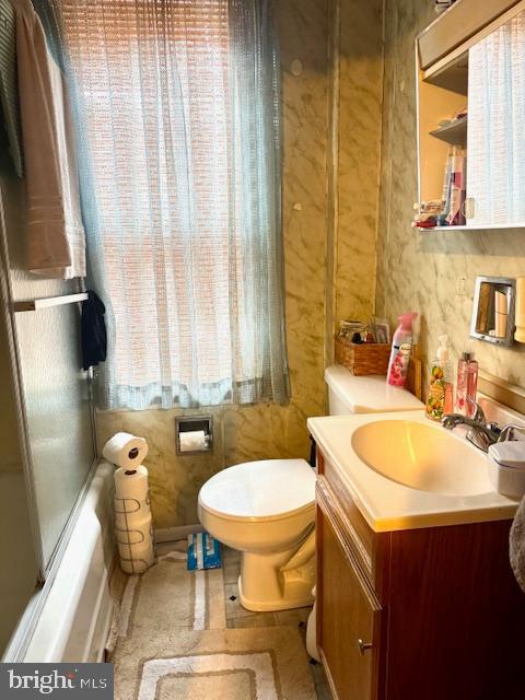 408 1/2 Chestnut Street Johnstown, PA 15906 - Photo 16 of 17 a bathroom with a sink a toilet and a mirror