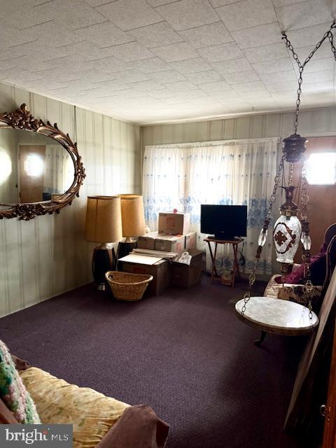 408 1/2 Chestnut Street Johnstown, PA 15906 - Photo 5 of 17 a living room with furniture and a flat screen tv