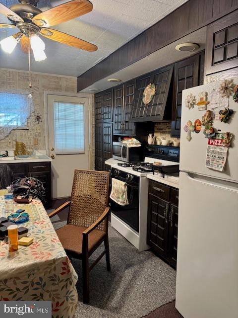 408 1/2 Chestnut Street Johnstown, PA 15906 - Photo 7 of 17 a kitchen with stainless steel appliances granite countertop a stove and a sink