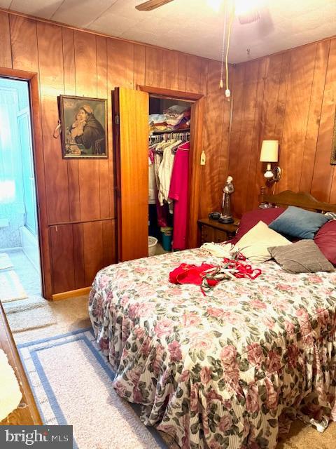 408 1/2 Chestnut Street Johnstown, PA 15906 - Photo 10 of 17 a bedroom with a bed and a chandelier