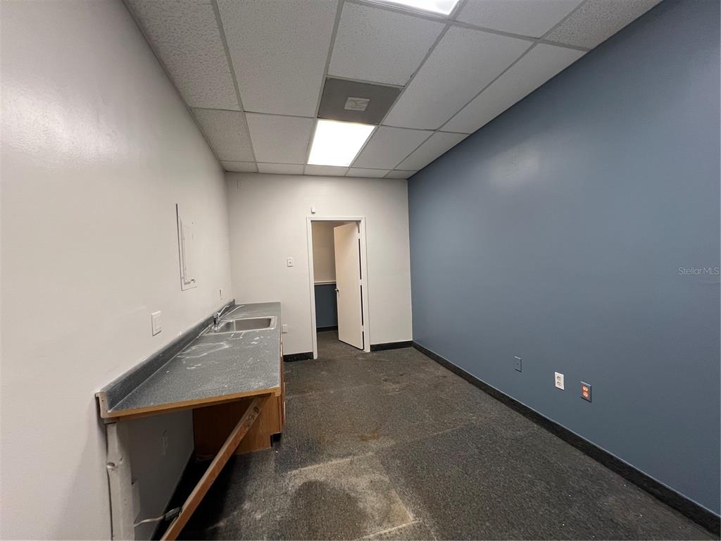 1173 Spring Centre S Boulevard, Unit A Altamonte Springs, FL 32714 - Photo 15 of 15 wooden floor in an empty room with a window