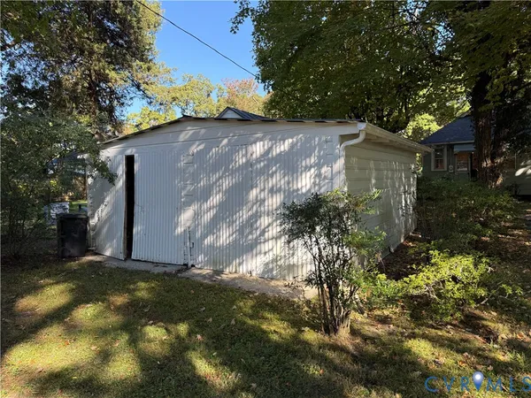 a view of backyard and tree