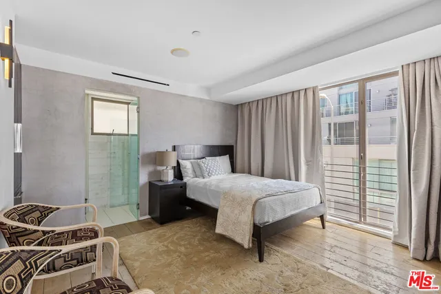 a bathroom with a sink vanity and mirror