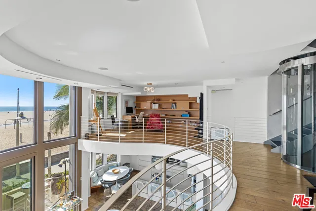 a view of a living room with furniture