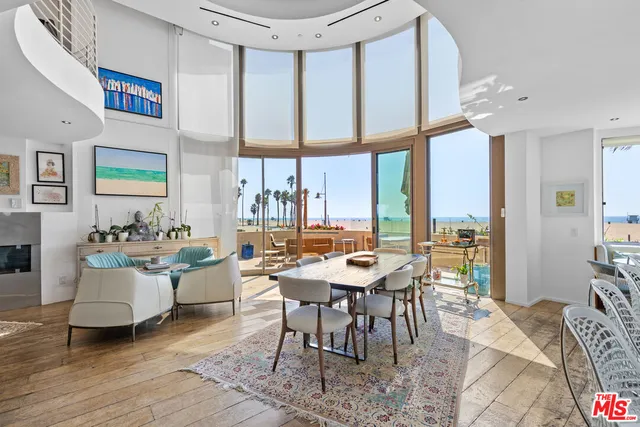 a view of a livingroom with furniture and window
