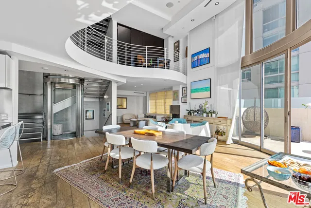 a outdoor space with lots of tables and chairs