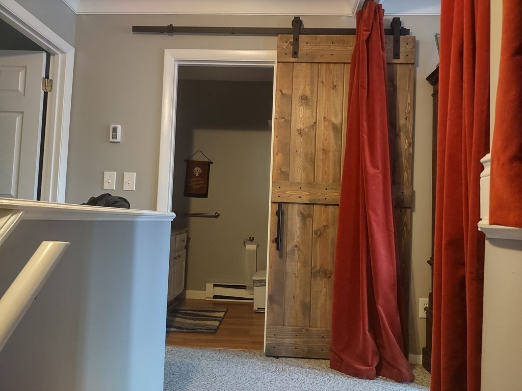 62 Round House Road, Unit 62 Bourne, MA 02532 - Photo 7 of 10 a bathroom with a shower and a sink