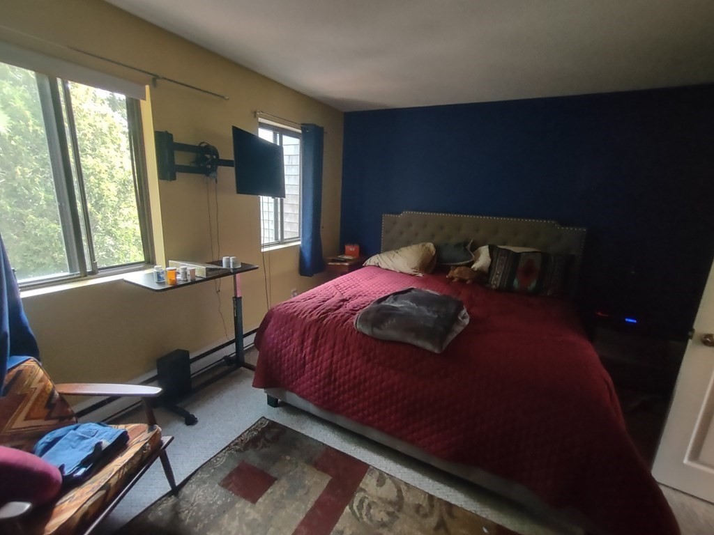62 Round House Road, Unit 62 Bourne, MA 02532 - Photo 10 of 10 a bedroom with a bed and window