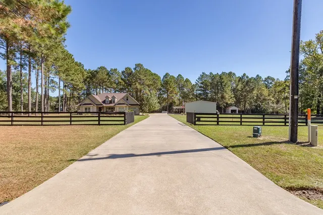 a view of swimming pool with a yard