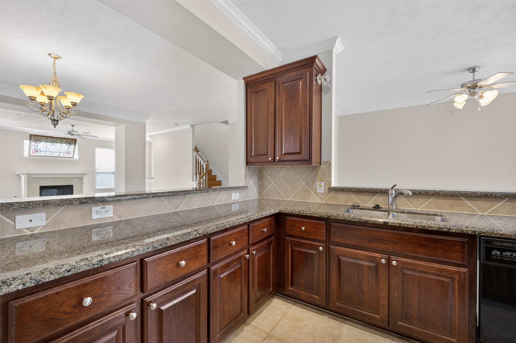 1807 Stacy Crest Houston, TX 77008 - Photo 15 of 35 a kitchen with granite countertop cabinets stainless steel appliances a sink and a window