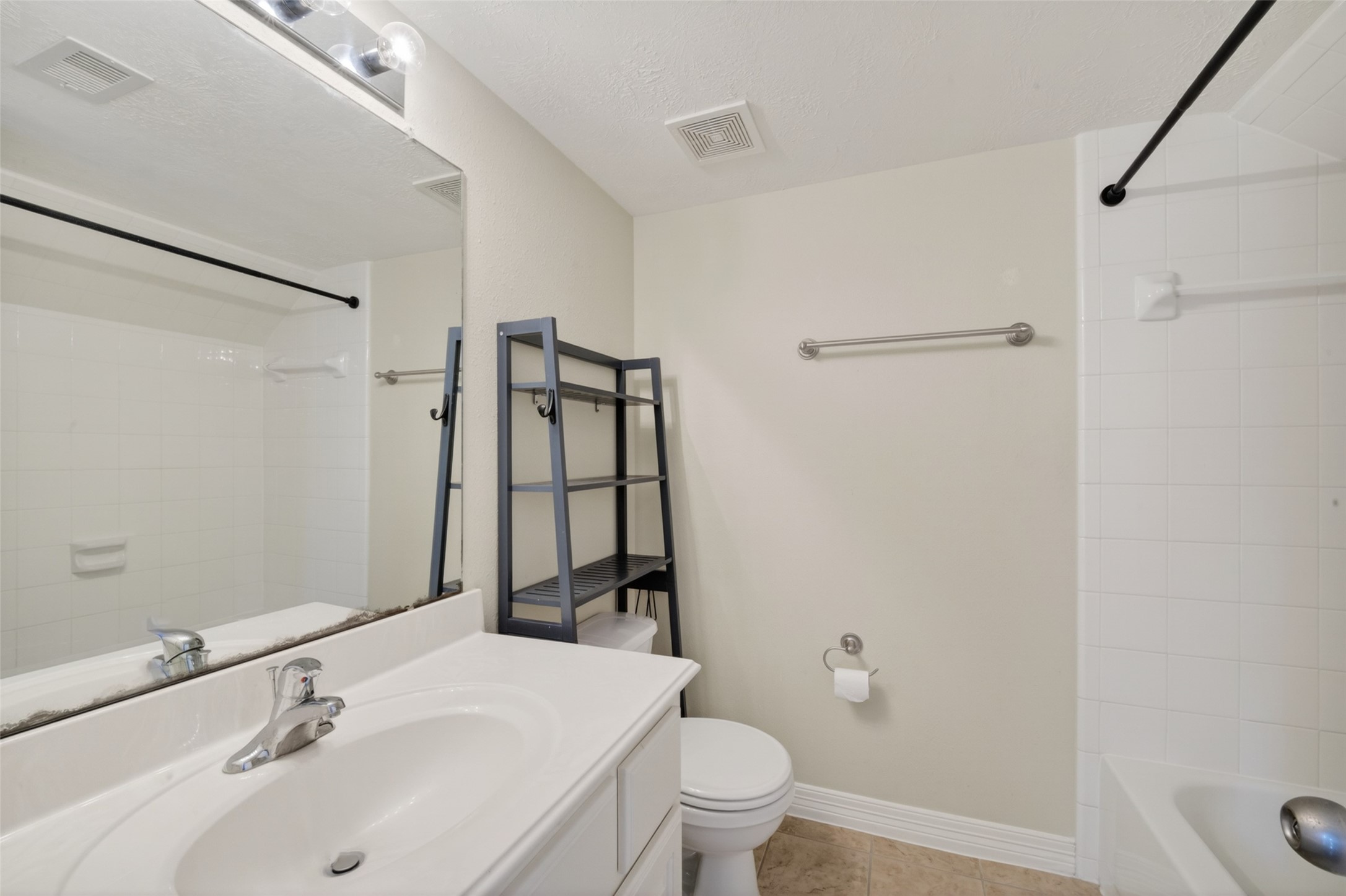 1807 Stacy Crest Houston, TX 77008 - Photo 22 of 35 a bathroom with a sink toilet and shower