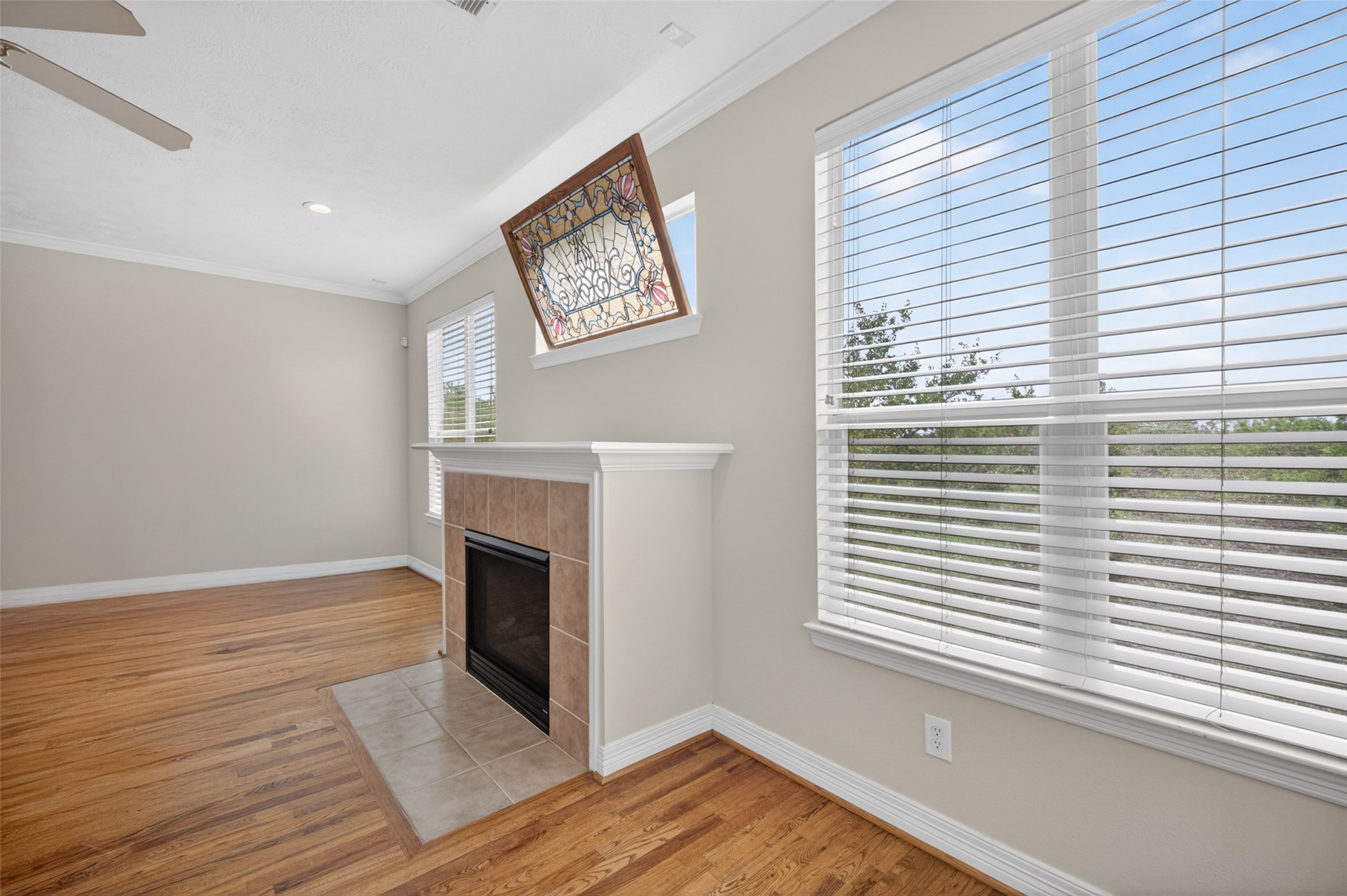 1807 Stacy Crest Houston, TX 77008 - Photo 8 of 35 a view of a livingroom with wooden floor and a fireplace