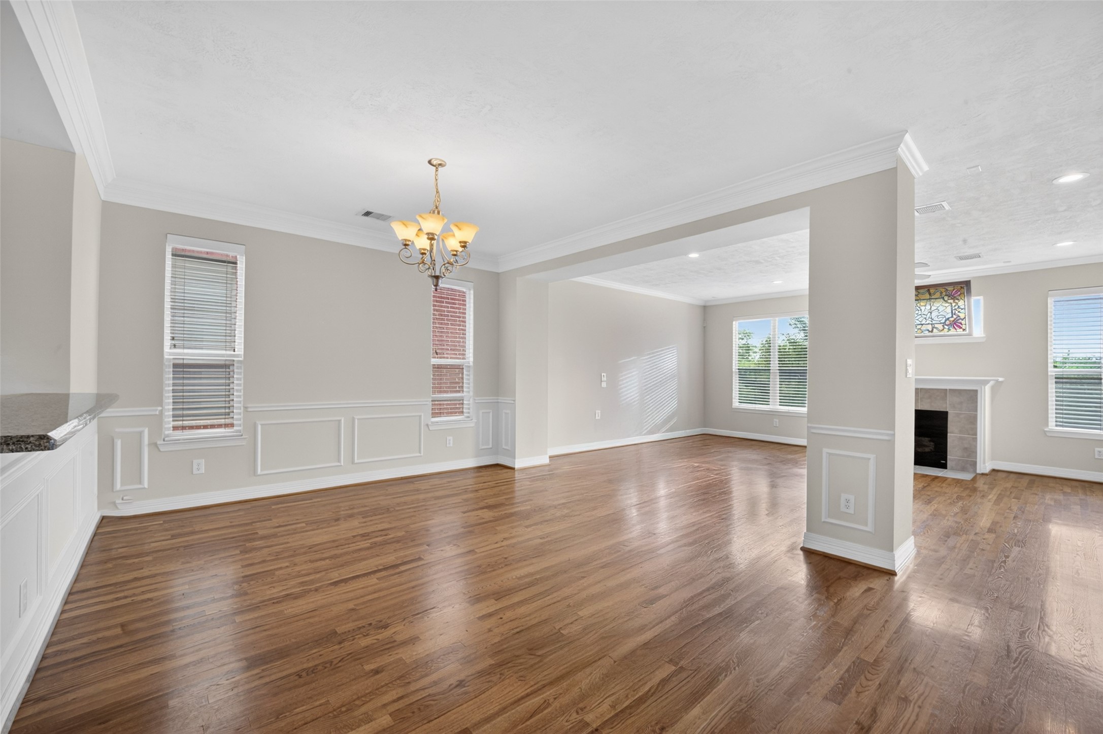 1807 Stacy Crest Houston, TX 77008 - Photo 10 of 35 a view of an empty room with wooden floor and a window