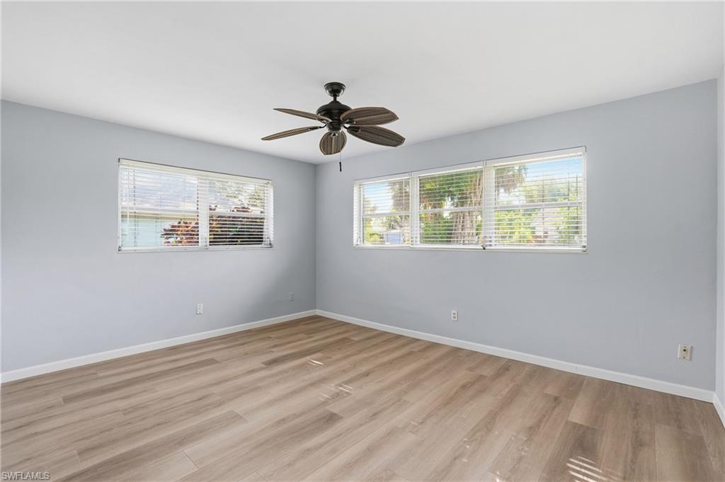 169 Viking Way Naples, FL 34110 - Photo 15 of 34 a view of an empty room with a window